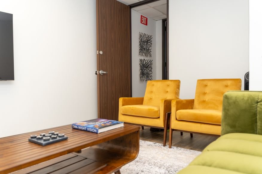 Calm, sunlit lobby of Altura Recovery, an outpatient addiction treatment center in Bellaire, Houston